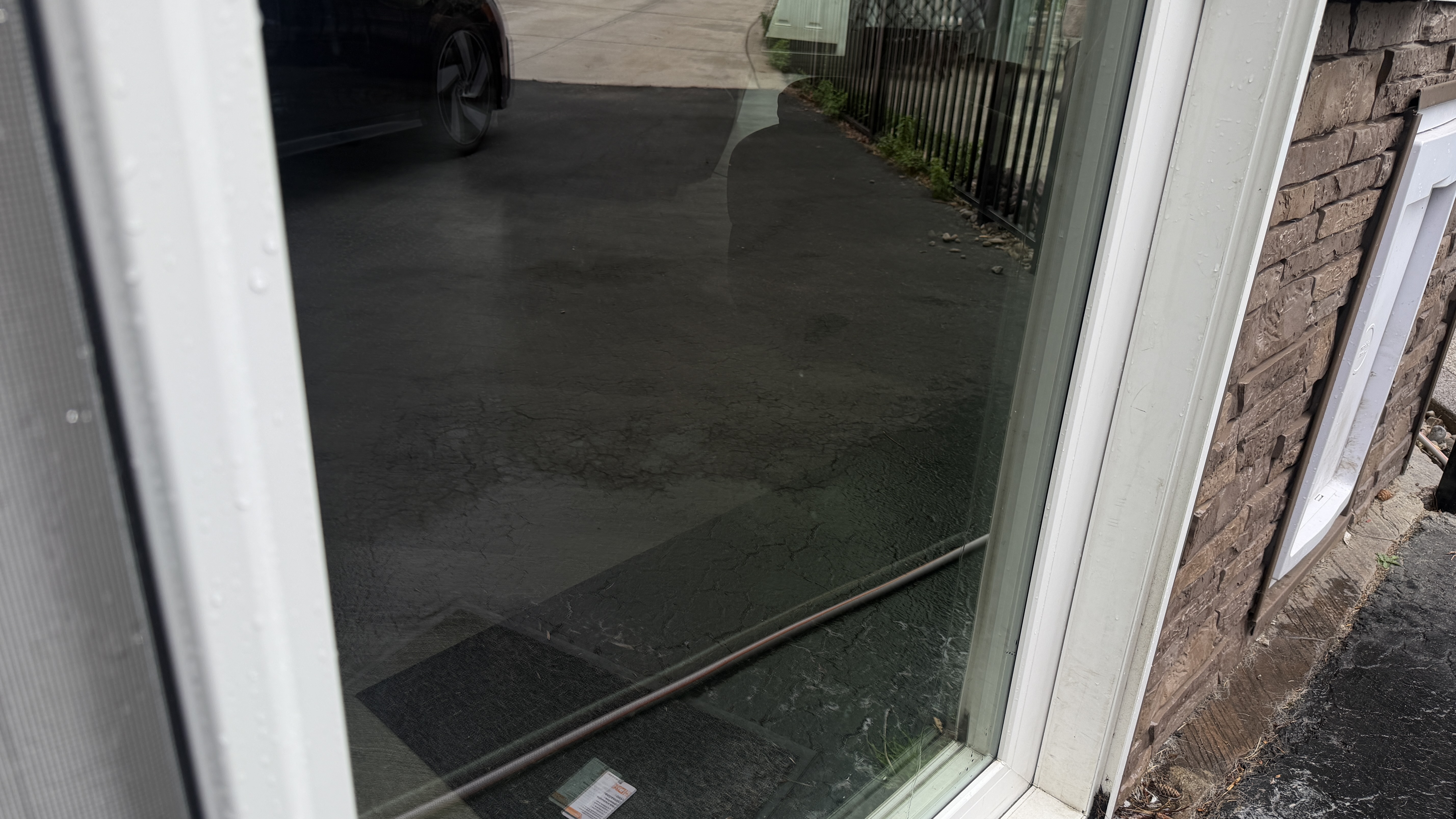 After cleaning: patio door glass looking clearer after service
